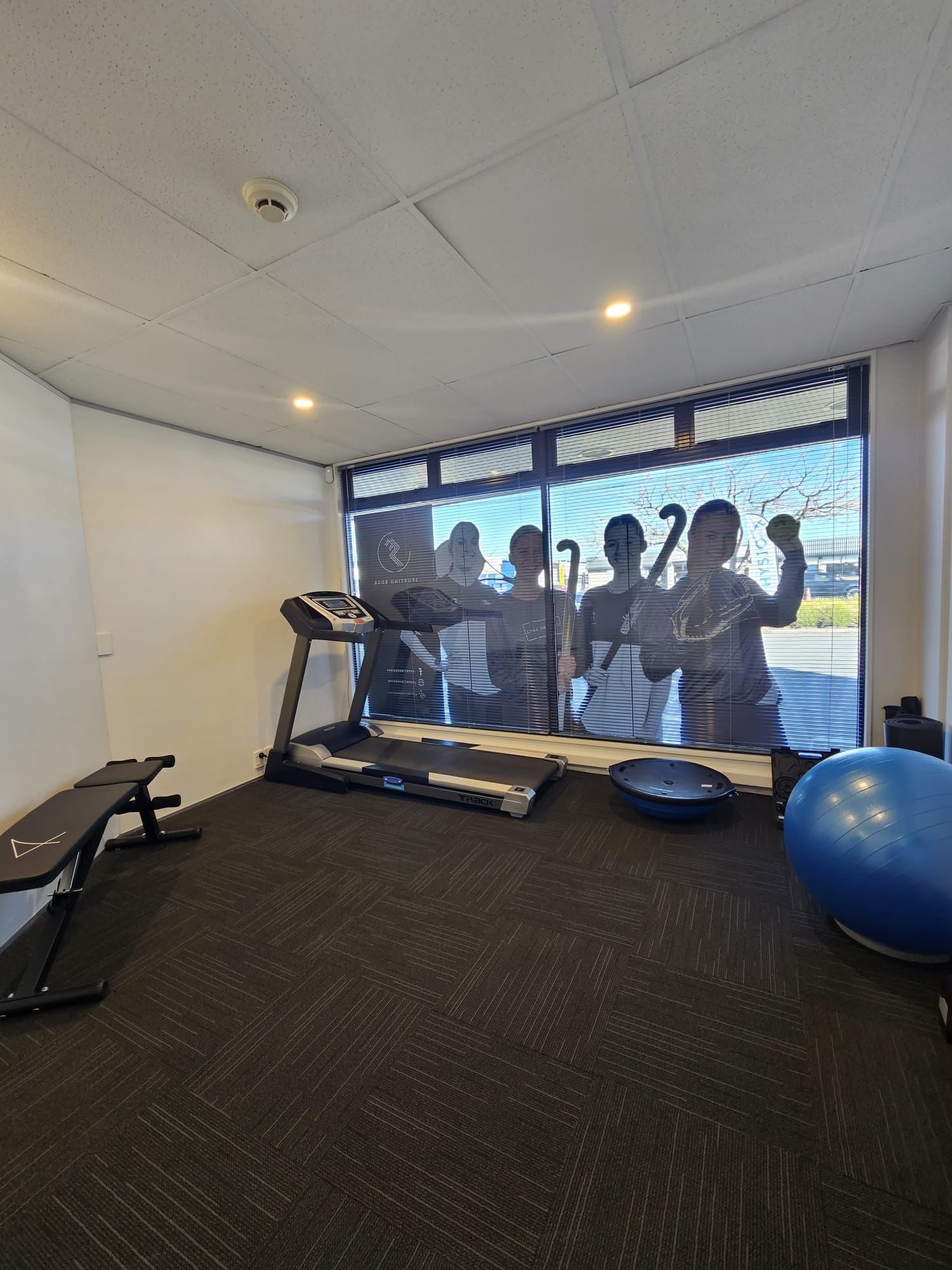 Rehabilitation space with treadmill, bench and exercise equipment